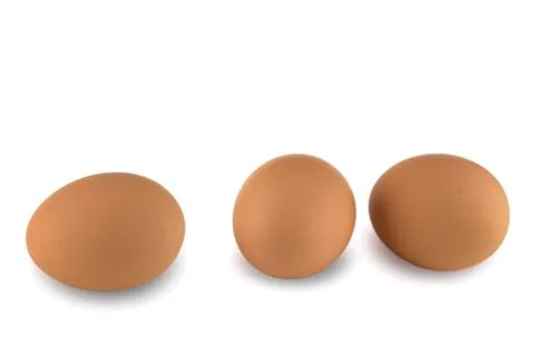 Three eggs on a white background Stock Photos