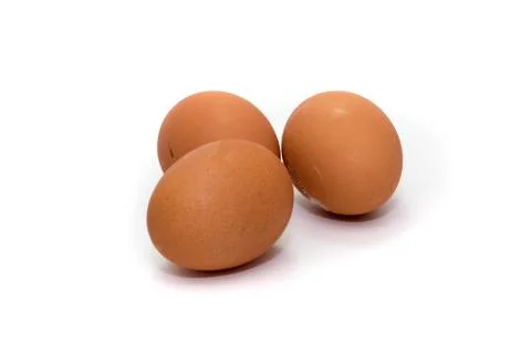 Three eggs on white background Stock Photos