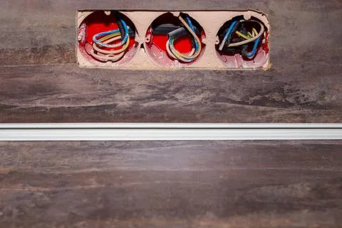 Three electrical outlets in the apron. Installation and repair of outlets, co Foto stock