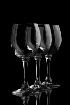 Three elegant wine glasses Stock Photos