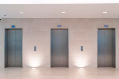 Three elevators Stock Photos