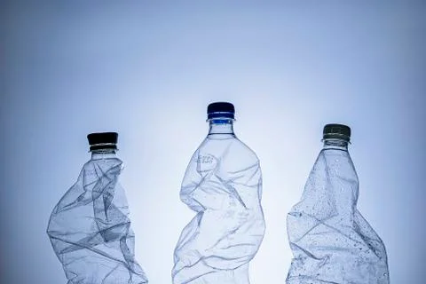 Three empty clear wet plastic bottles Stock Photos