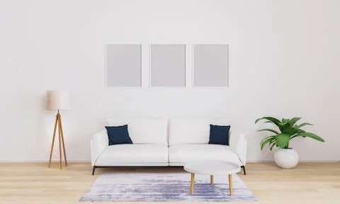 Three empty frame for mockup. Bright living room with white sofa with dark bl Stock Photos