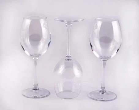 Three empty glass glasses Foto stock