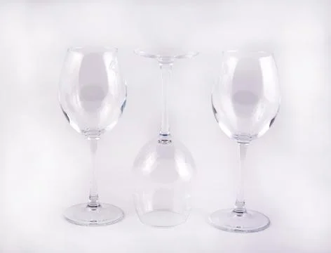 Three empty glass glasses Stock Photos