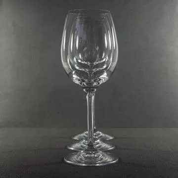 Three empty glasses on the row Stock Photos