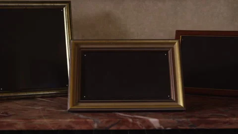 Three Empty Photo Frame. Slow camera movement Stock Footage 263221820