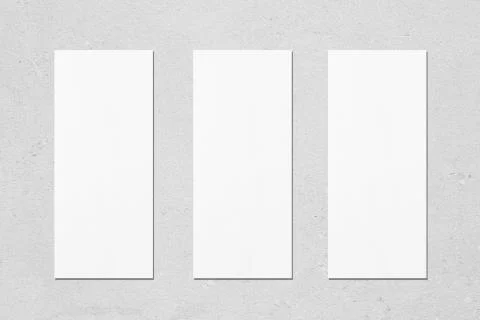 Three empty white vertical rectangle poster menu mockups Stock Photos