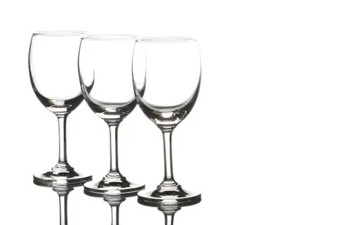 Three empty wine glasses on white background Stock Photos