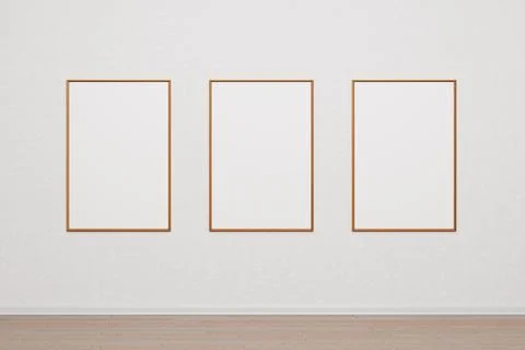 Three empty wooden frames for a photo or picture on a white wall. Mockup pa.. Illustrazione stock