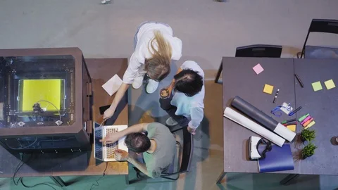 Three engineers creating 3d models in lab Stock Footage 111640337