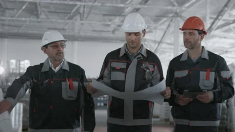 Three Engineers Plan Work. Group of Caucasian People in Safety Hard Hat. Communi 스톡 동영상 199476260