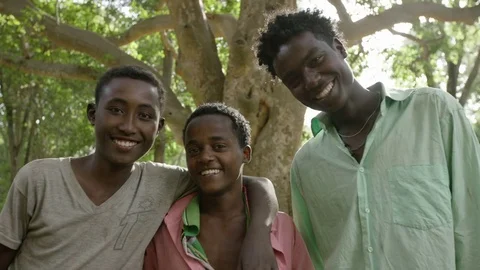 Three Ethiopean boys smiling Stock Footage 79698027