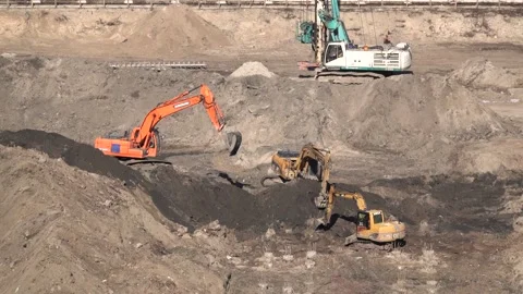 Three excavators are working Stock Footage 147250047