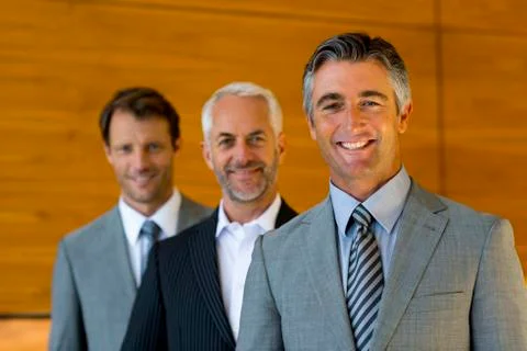 Three executives in a line. Stock Photos
