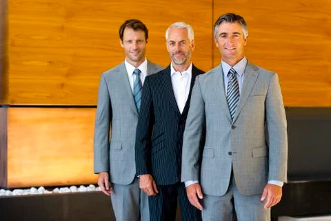 Three executives in a line. Stock Photos