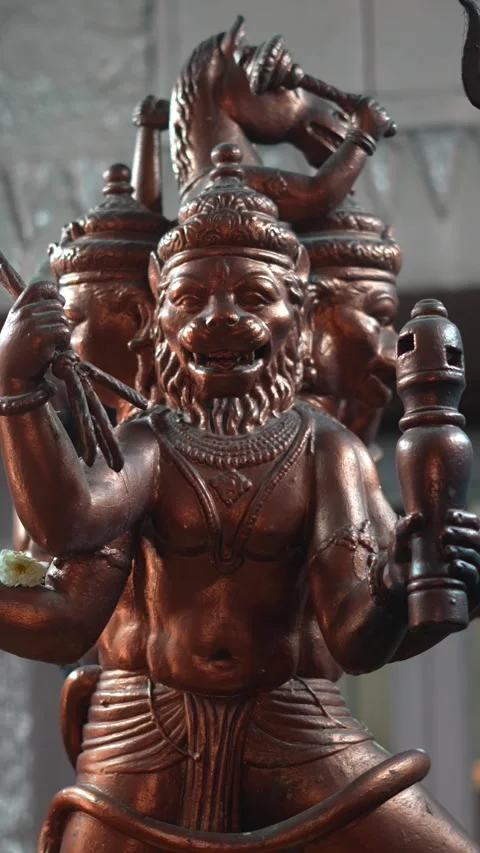 Three Faced Narasimha Idol in Traditional Hindu Temple Art and Sculpture Stock Footage 336884529