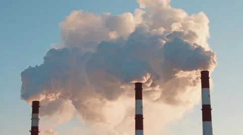 Three factory smokestacks Stock Footage 46882332