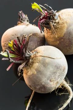 Three farm fresh raw beetroot Stock Photos