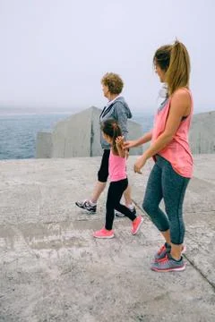 Three female generations walking Stock Photos