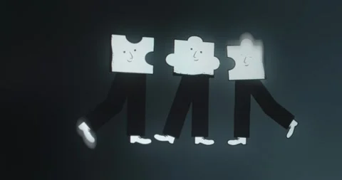 Three figures each with a puzzle piece as a head Stock Footage 313557870