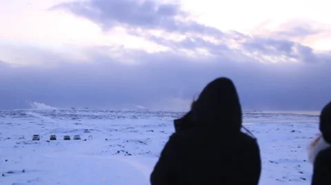 Three Figures Walk through epic white snowy landscape Stock Footage 47202088