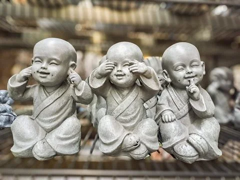 Three figurine children,, does not see, does not hear, does not speak. Stock Photos