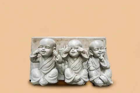Three figurine children, does not see, does not hear, does not speak. Stock Photos
