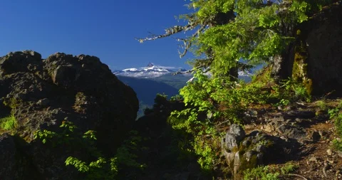 Three Fingered Jack rises along the crest of the Oregon Cascades Stock Footage 127674939