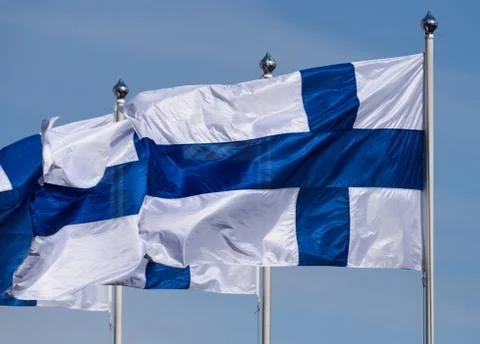 Three Finnish flags flying Stock Photos