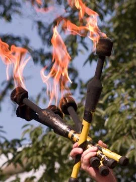 Three Fire Batons Stock Photos