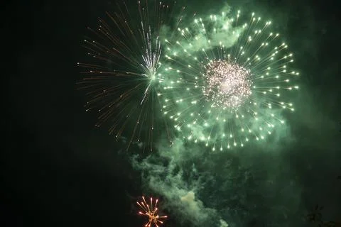 Three fireworks exploding Stock Photos