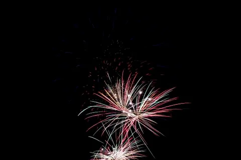 Three fireworks explosion Stock Photos