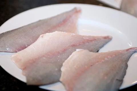 Three fish fillets Stock Photos