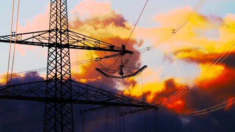 Three fitters working on a side boom of a power pylon Stock Footage 163084249