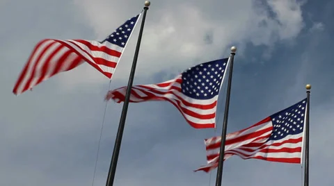 Three Flags American Flags fluttering in strong wind Stock Footage 49774722