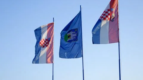 Three flags blowing in the wind, Zagreb, Croatia Stock Photos