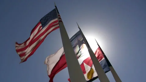 Three Flags With Bright Sun Glare Video stock 36573841