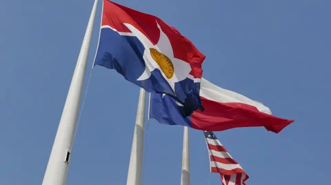 Three flags fluttering against blue sky 스톡 동영상 55924820