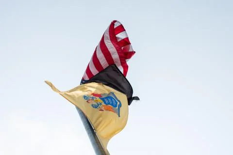 Three Flags Flying in a Grey Sky, One Being a United States Flag Stock Photos