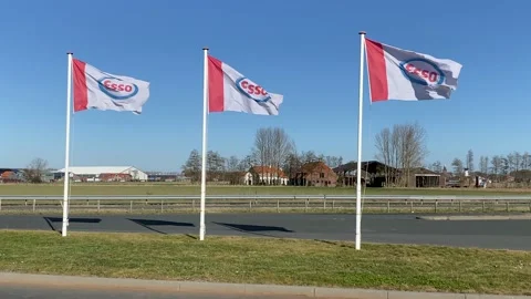 Three Flags of the petrol station of the petrol company Esso. Stock Footage 149372258