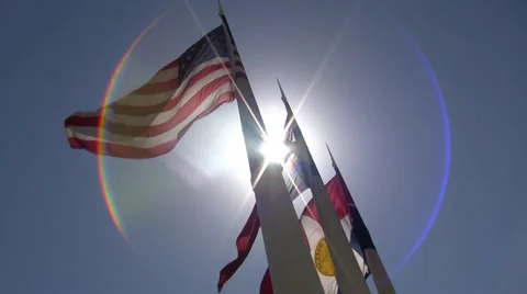 Three Flags With Sun Glare Video stock 36592275
