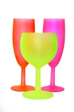 Three fluo-coloured glasses 库存照片