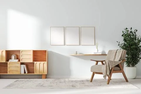 Three frames mockup in living room interior background with armchair and c... 스톡 사진