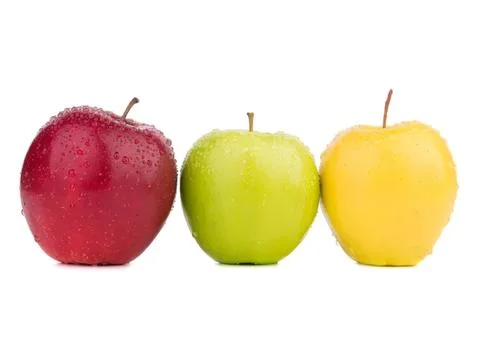 Three fresh apples in red green and yellow colors Stock Photos
