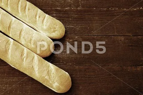 Three fresh baguette Stock Photos