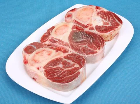 Three fresh beef shanks Stock Photos