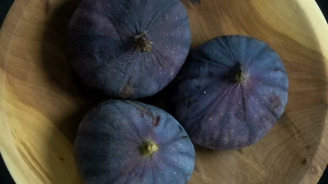 Three fresh figs rotate Stock Footage 145436036