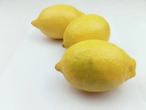 Three Fresh Lemons on White Background Stock Photos