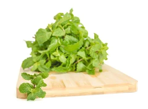 Three fresh mint leaves isolated on white background. studio macro Stock Photos